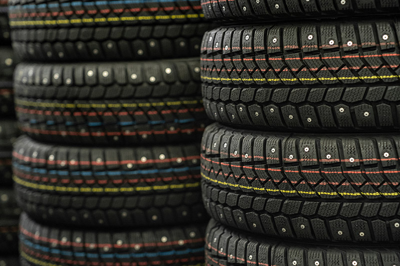 Sale Of Car Tires For Sale In The Store. Many New Winter Tires Lie